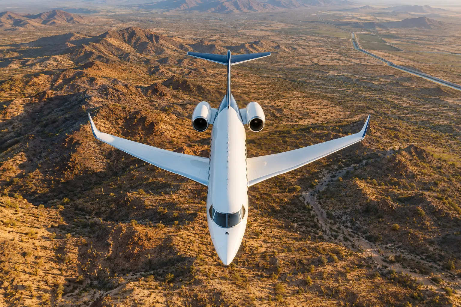 Private jet climbing out over Phoenix